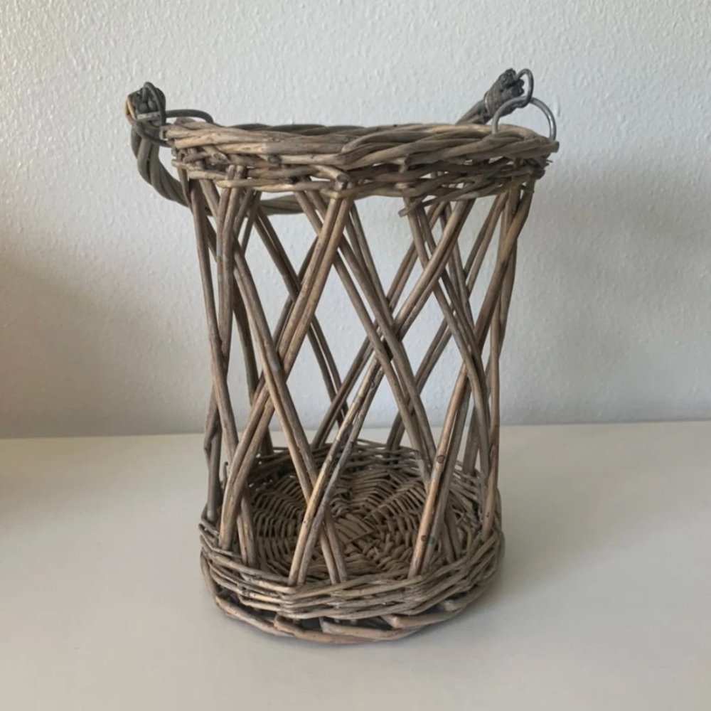 Antique wicker candle holder